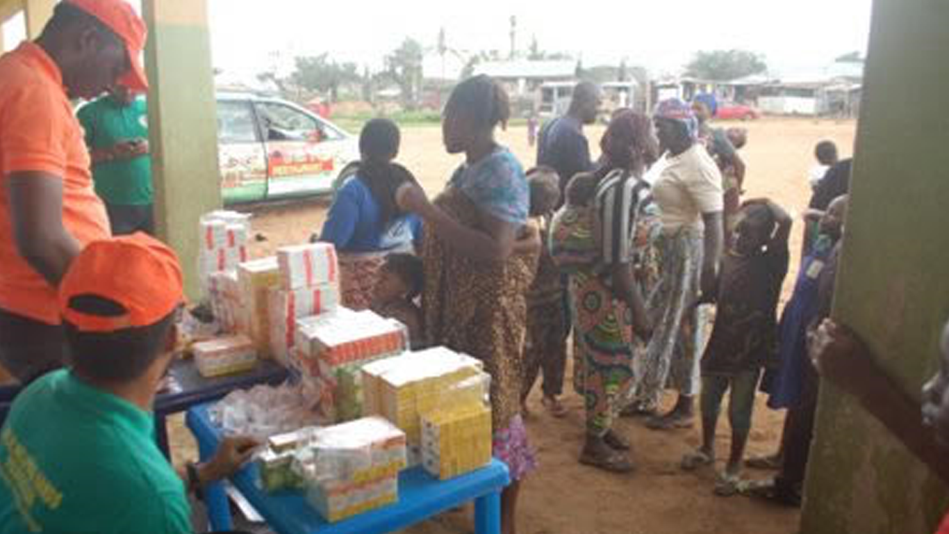 Pharmacists dispensing medications to beneficiaries